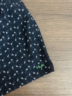 Huk Men’s Black Swim Shorts with White Fish Print and Green Logo